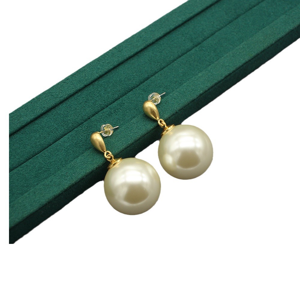 Exaggerated table tennis earrings Spanish designer earrings versatile Japanese cotton bead earrings